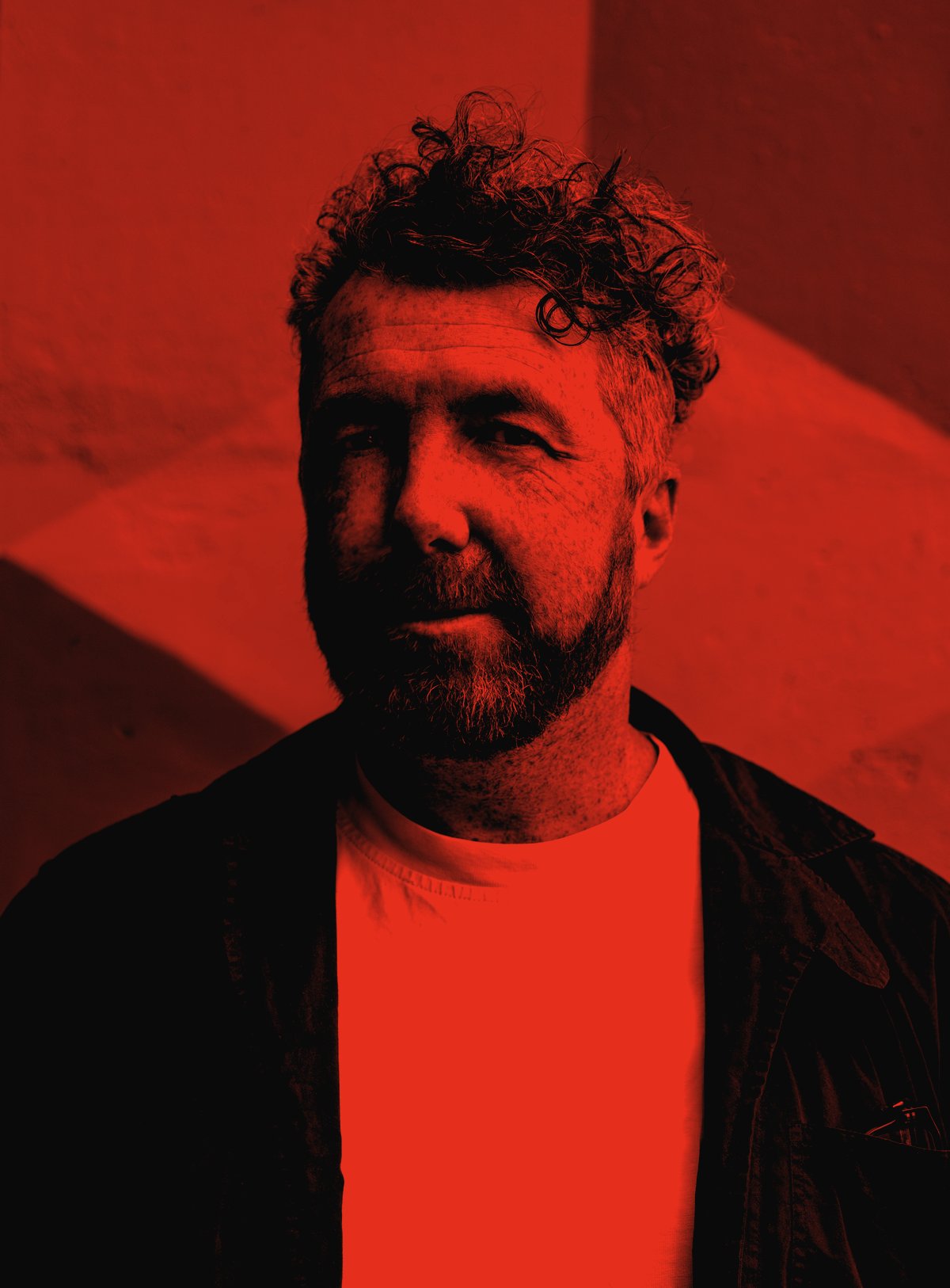 Paul Burke, red duotone portrait